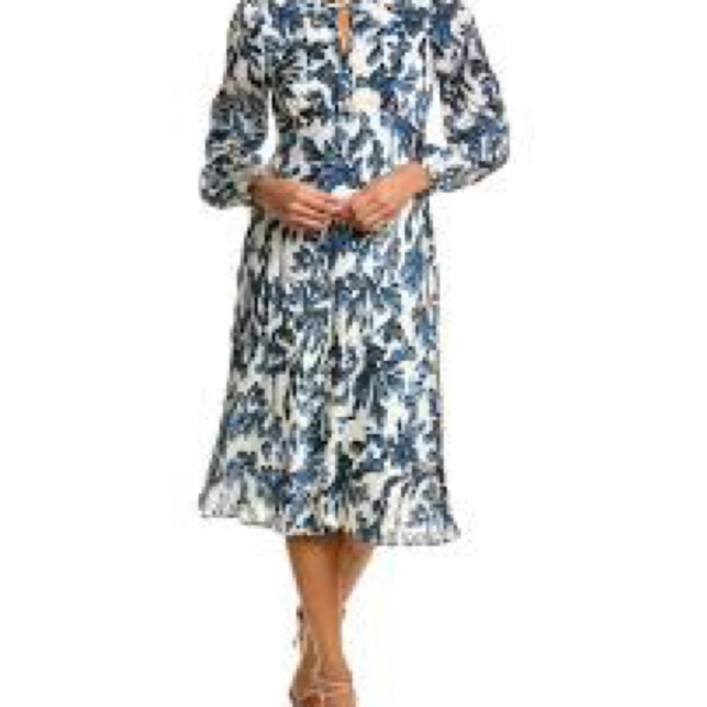 Floral scroll printed lined dress;fitted through the breast with relaxed waist.